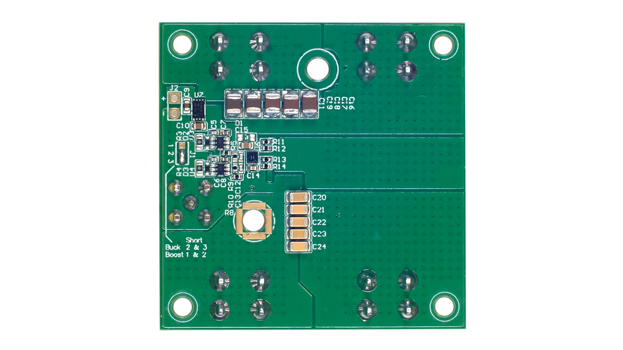 EVB-RTP100E2P6G1FL 评估板底视图，展示了 PCB 布线、无源元件、焊盘以及连接点。