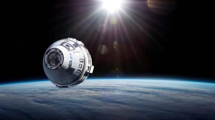 Starliner spaceship in space.
